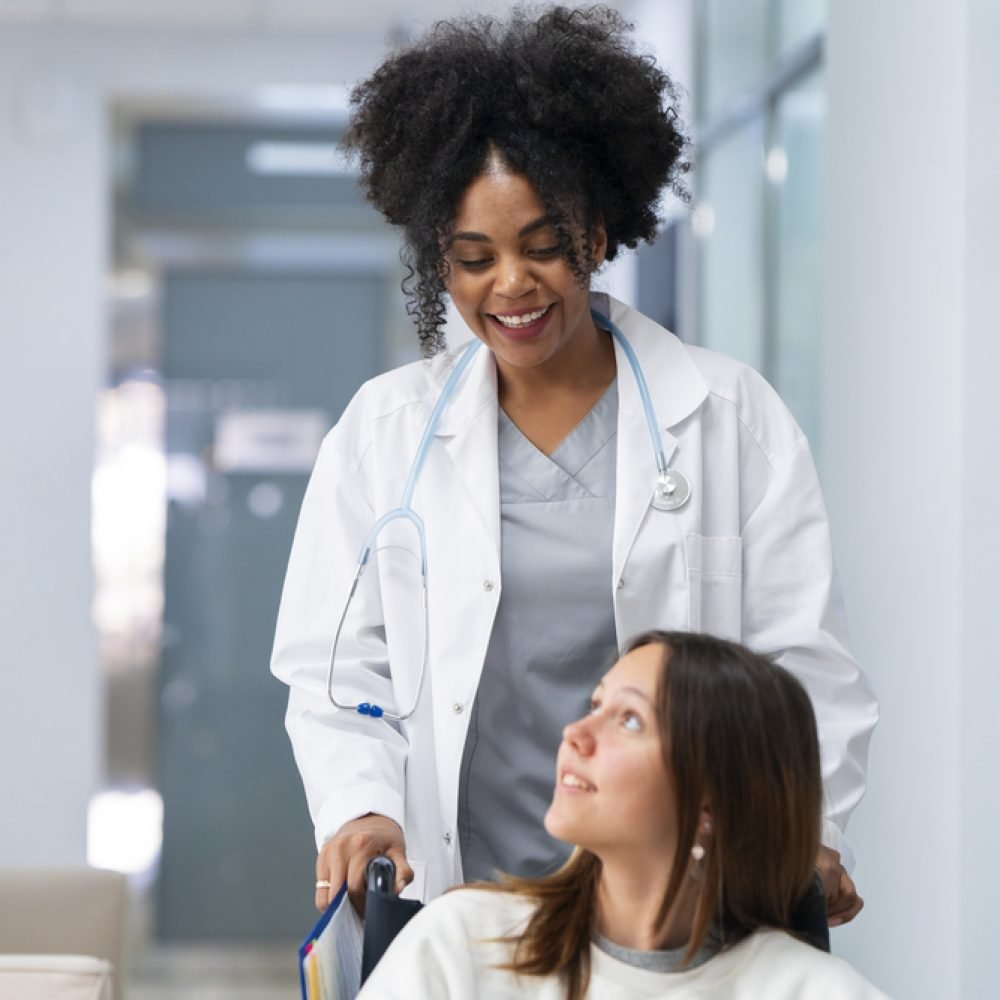 front-view-smiley-female-doctor-patient (1)